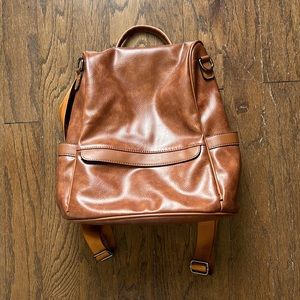 Brown leather backpack